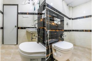 a bathroom with a toilet and a sink at FabHotel Crown Heights in Bangalore