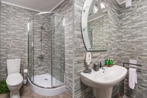 A bathroom at Hotel Villa Magus