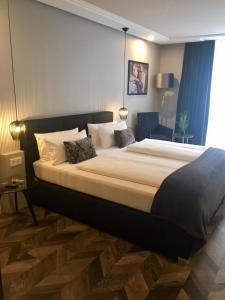 Postel nebo postele na pokoji v ubytování Hotel Zuckerfabrik