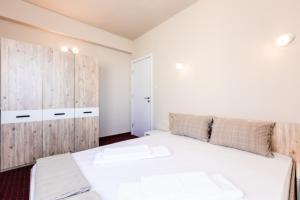 Кровать или кровати в номере Guest House Theona