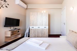 Кровать или кровати в номере Guest House Theona