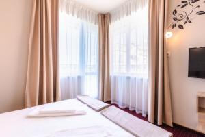 Кровать или кровати в номере Guest House Theona