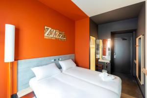
Een bed of bedden in een kamer bij Ibis Budget Bilbao City
