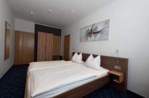 Katil atau katil-katil dalam bilik di PrivatHotel Probst