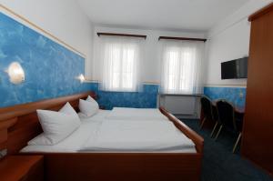 Katil atau katil-katil dalam bilik di PrivatHotel Probst