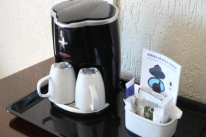 Příslušenství pro přípravu čaje a kávy v ubytování Hotel A.S. Lisboa