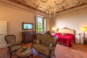 Posteľ alebo postele v izbe v ubytovaní Agriturismo Villa Ulivello in Chianti