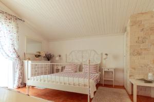 Postel nebo postele na pokoji v ubytování Villa O'Zrna + 37 fotografií