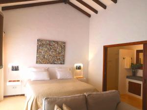 Säng eller sängar i ett rum på Sharish - Monte Das Estevas