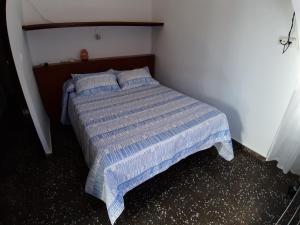 Postel nebo postele na pokoji v ubytování Pensíon Lucia