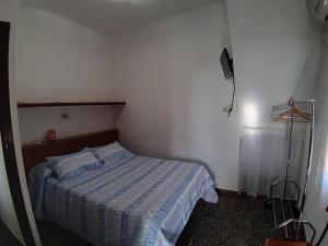 Postel nebo postele na pokoji v ubytování Pensíon Lucia