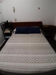 Postel nebo postele na pokoji v ubytování Pensíon Lucia