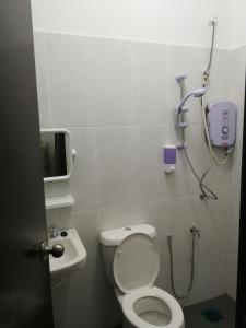 a bathroom with a toilet and a shower at Homestay ayer keroh mitc in Melaka