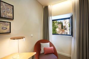 Posezení v ubytování Suites Murillo Plaza Sta. Cruz