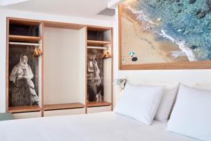 Postel nebo postele na pokoji v ubytování Olive Green Hotel