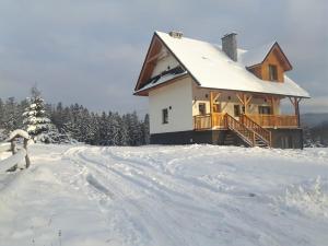 Apartament z kominkiem i wanną v zimě