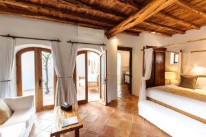 Cama ou camas em um quarto em Agroturismo Atzaró