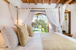 Cama ou camas em um quarto em Agroturismo Atzaró