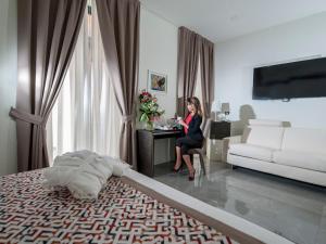 Postel nebo postele na pokoji v ubytování Palazzo Firenze + 37 fotografií