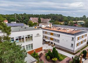 an aerial view of a hotel in a city at Pomorze Ustka in Ustka