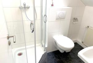 Koupelna v ubytování Hana Aparthotel