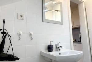 Koupelna v ubytování Hana Aparthotel