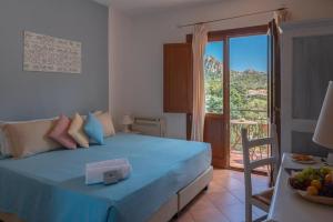 Rúm í herbergi á Boutique Hotel Sant'Andrea & Relais