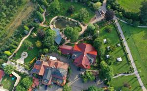 an overhead view of a house with a park at Hotel Rebstock Durbach in Durbach