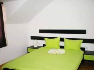 Postel nebo postele na pokoji v ubytování Vila Čair DOPLATA ZA BAZEN