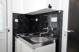 Kuchyň nebo kuchyňský kout v ubytování Apartments Kruna Jovanović + 37 fotografií