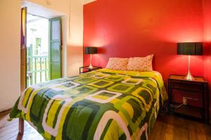 Giường trong phòng chung tại Dragonfly Hostels Cusco