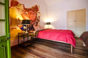 Giường trong phòng chung tại Dragonfly Hostels Cusco