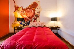 Giường trong phòng chung tại Dragonfly Hostels Cusco