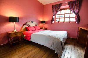 Giường trong phòng chung tại Dragonfly Hostels Cusco
