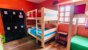 Giường tầng trong phòng chung tại Dragonfly Hostels Cusco