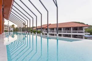 Bazén v ubytování Palmyrah Surin Apartments by Beringela nebo v jeho okolí