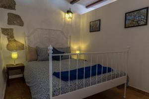 A bed or beds in a room at CR La Bohemia