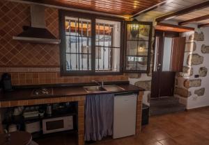 A kitchen or kitchenette at CR La Bohemia