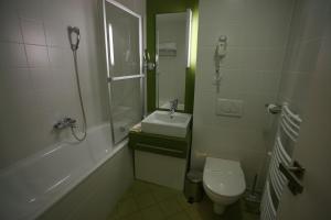 Kúpeľňa v ubytovaní Hotel EMPIRE