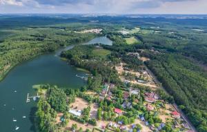 an aerial view of a river and a town at Apartament 6 osobowy in Kujan