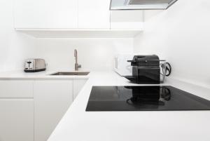Kuchyň nebo kuchyňský kout v ubytování Apartamento Ferrandiz