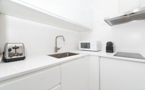 Kuchyň nebo kuchyňský kout v ubytování Apartamento Ferrandiz