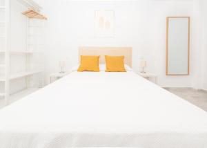 Postel nebo postele na pokoji v ubytování Apartamento Ferrandiz