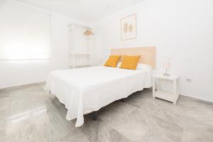 Postel nebo postele na pokoji v ubytování Apartamento Ferrandiz