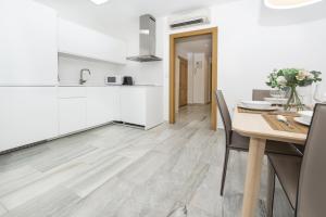 Kuchyň nebo kuchyňský kout v ubytování Apartamento Ferrandiz