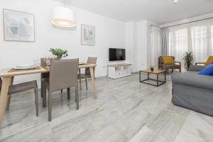 TV a/nebo společenská místnost v ubytování Apartamento Ferrandiz