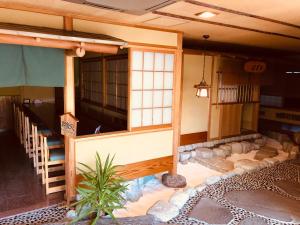 Posezení v ubytování Matsushima Koumura + 20 fotografií
