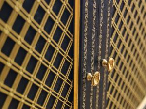 a close up of a black door with grids at 5th & 55th Residence Club in New York
