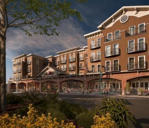 a rendering of a hotel on a city street at The Heathman Hotel Kirkland in Kirkland