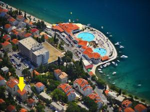 an aerial view of a resort with two swimming pools at Apartments Pekera in Selce